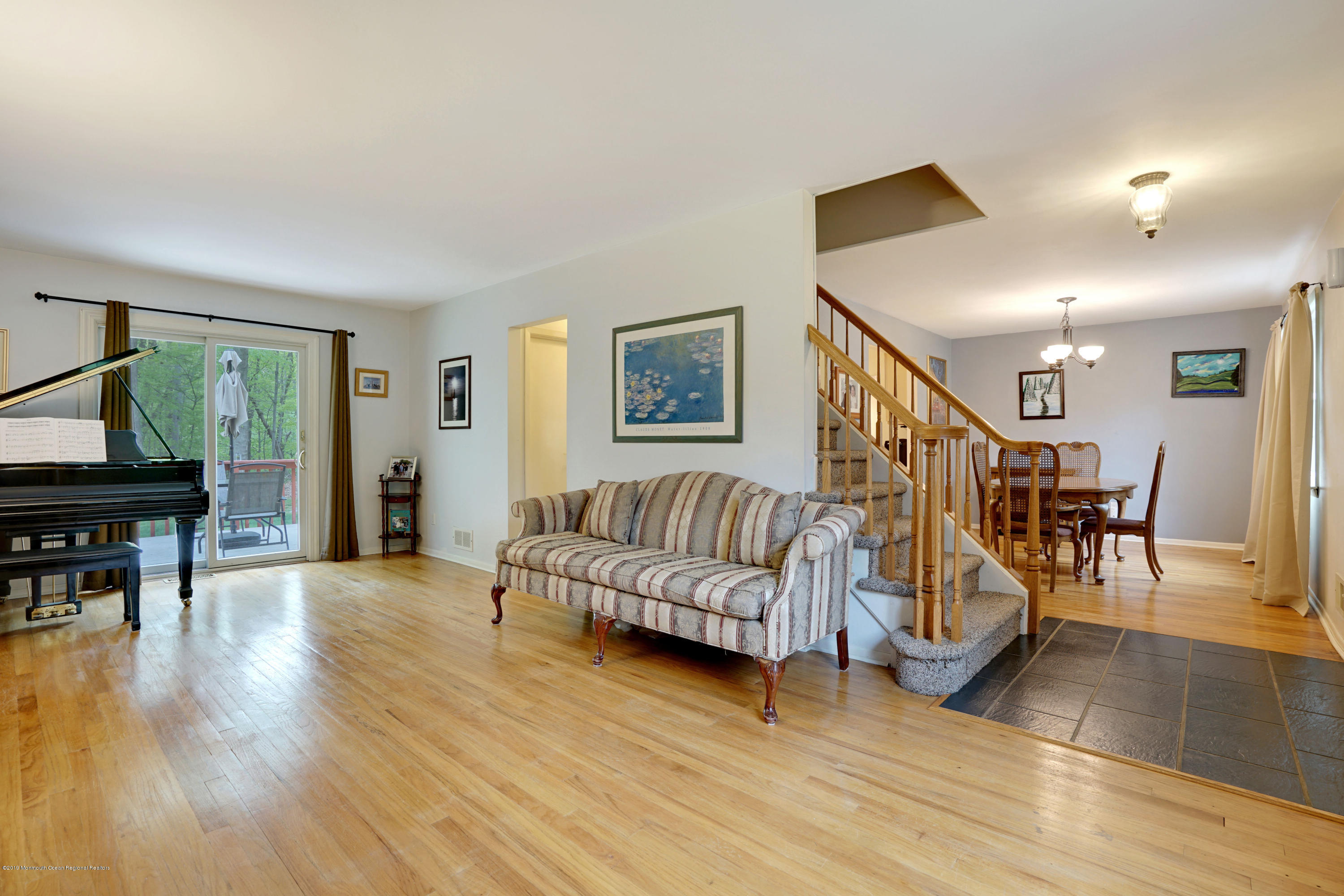 26 Marc Drive Matawan, NJ 07747 - Photo 7 of 30 a living room with furniture and a wooden floor