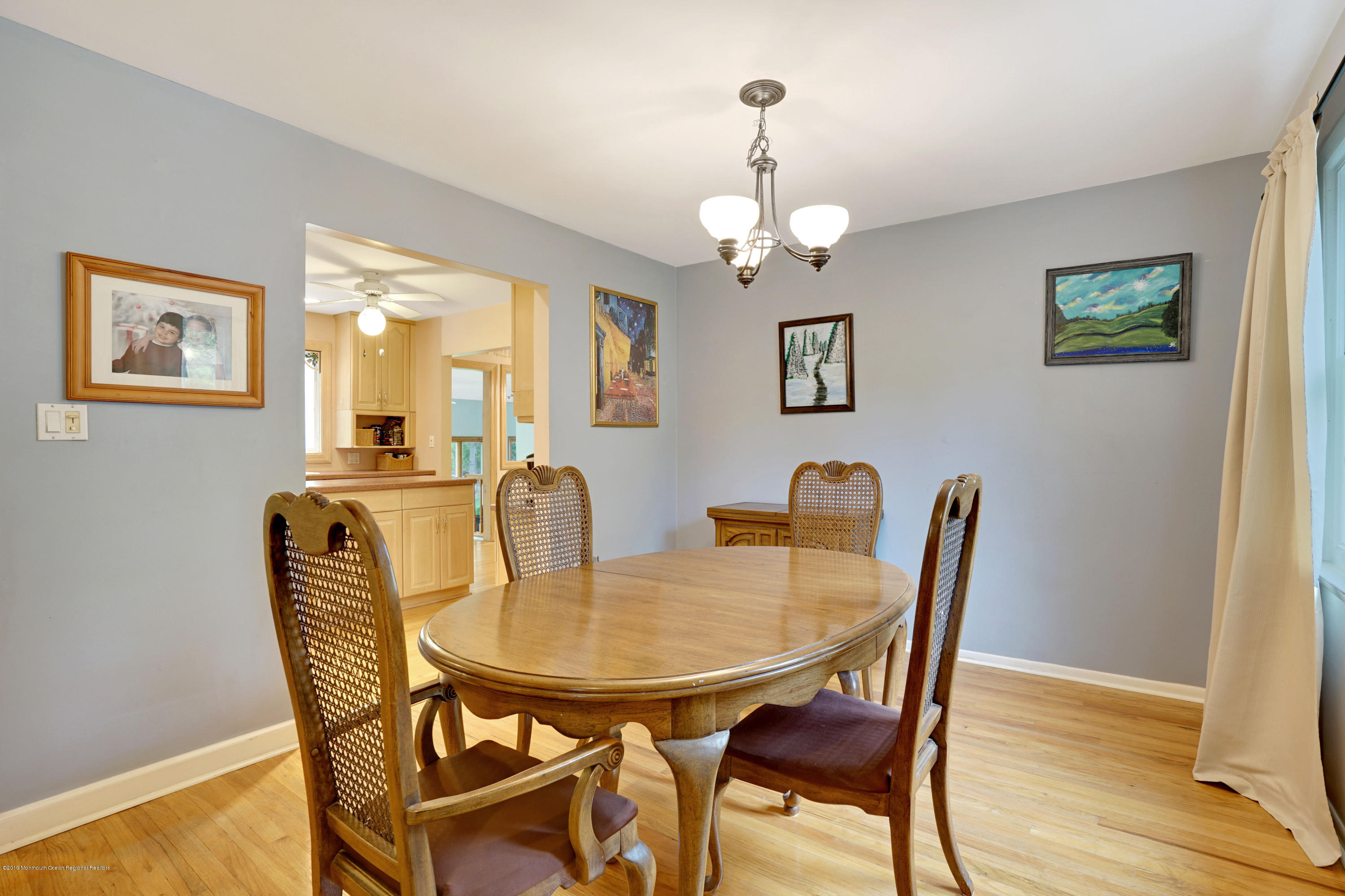 26 Marc Drive Matawan, NJ 07747 - Photo 8 of 30 a view of a dining room with furniture and wooden floor