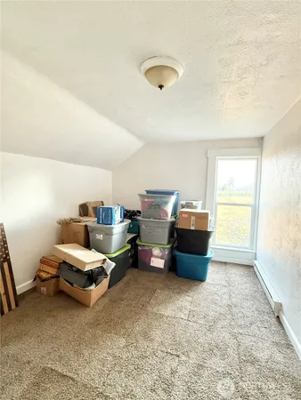 a dining room with a sink and a window