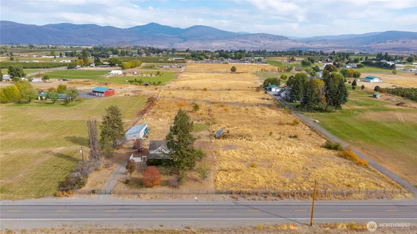 a view of a city with mountains in the background