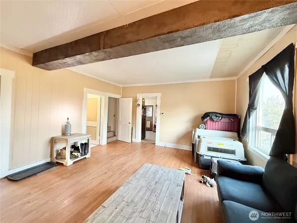 a kitchen with stainless steel appliances kitchen island granite countertop a refrigerator and a stove top oven