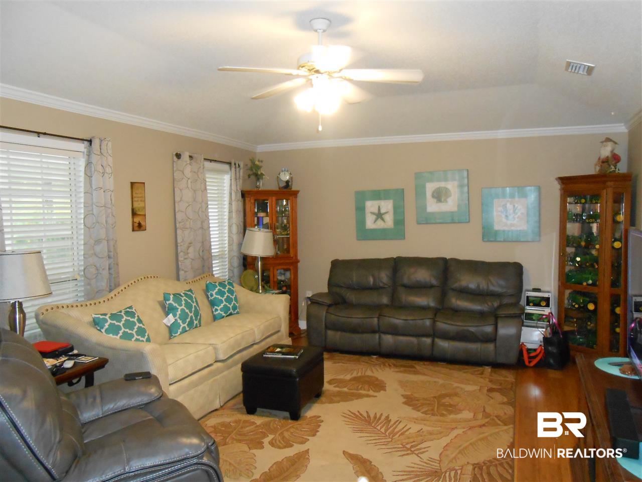 33669 Rosalia Avenue Lillian, AL 36549 - Photo 5 of 14 Beautiful birch hardwood floors