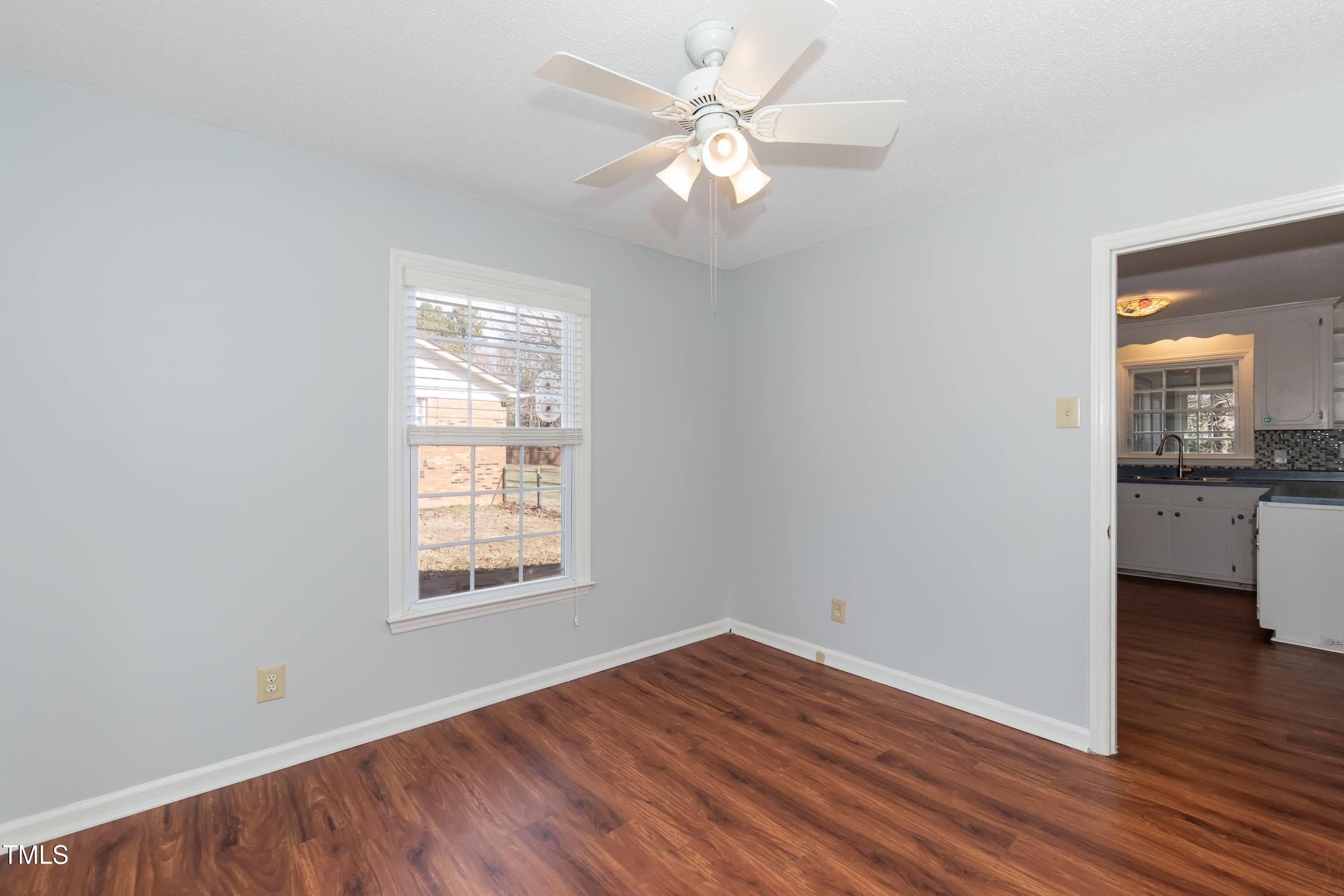 5604 Genesee Drive Durham, NC 27712 - Photo 18 of 45 wooden floor in an empty room with a window
