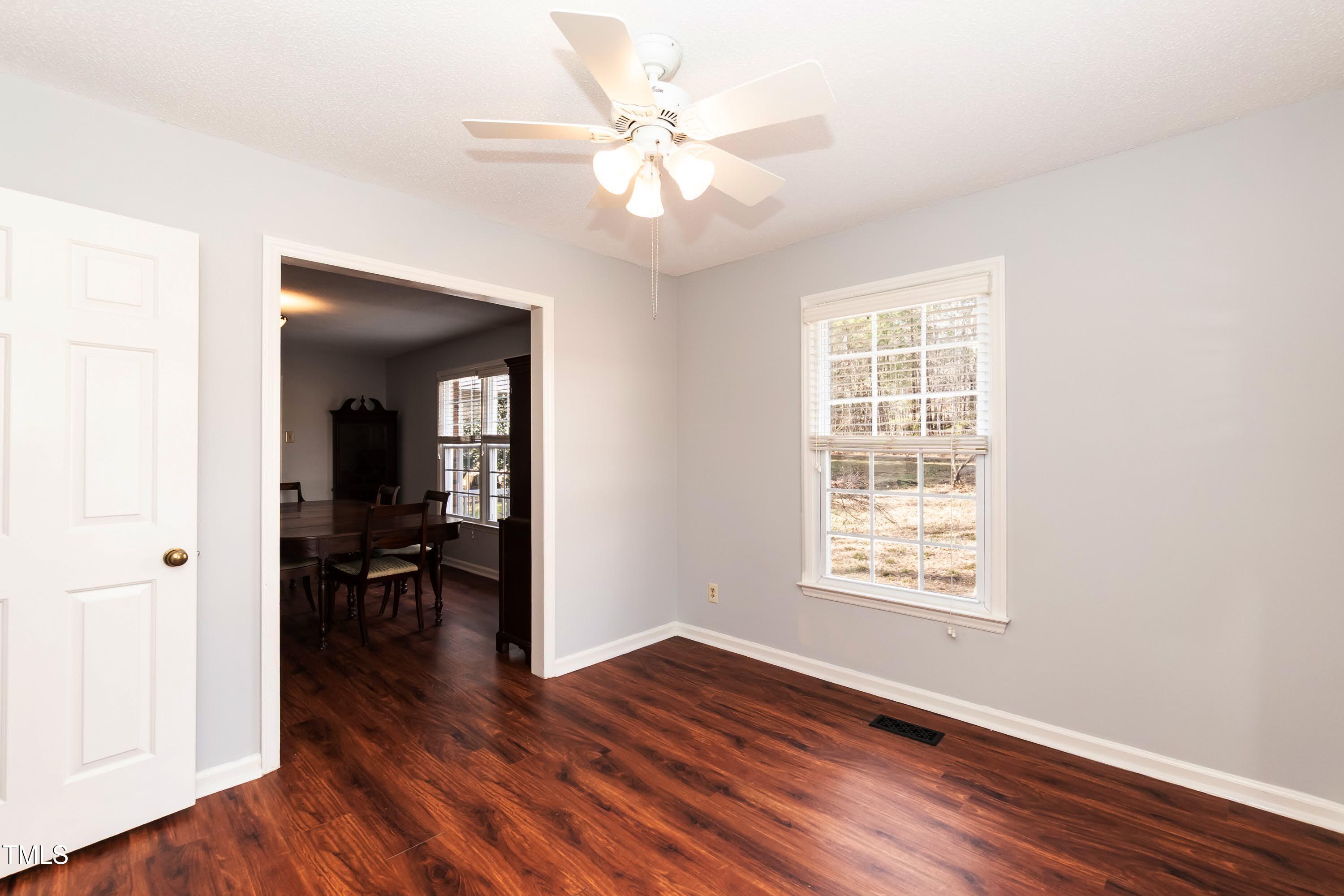 5604 Genesee Drive Durham, NC 27712 - Photo 19 of 45 wooden floor in an empty room with a window
