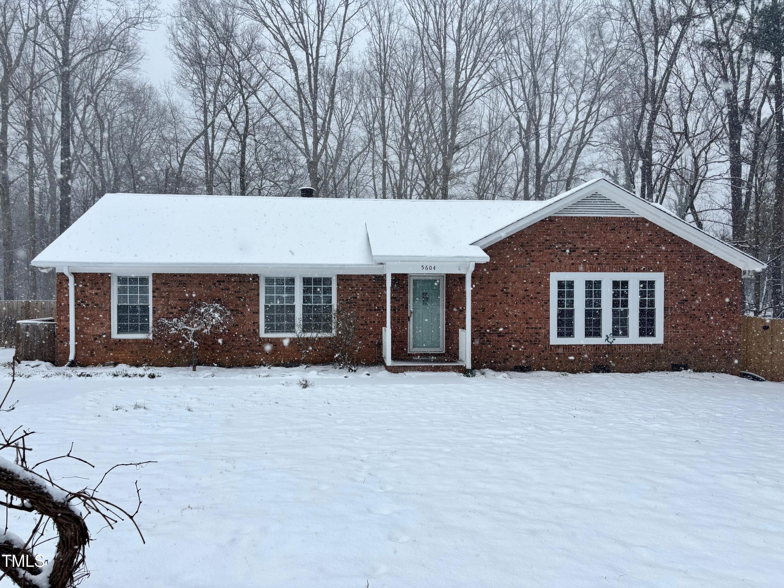 5604 Genesee Drive Durham, NC 27712 - Photo 2 of 45 a front view of a house with a yard