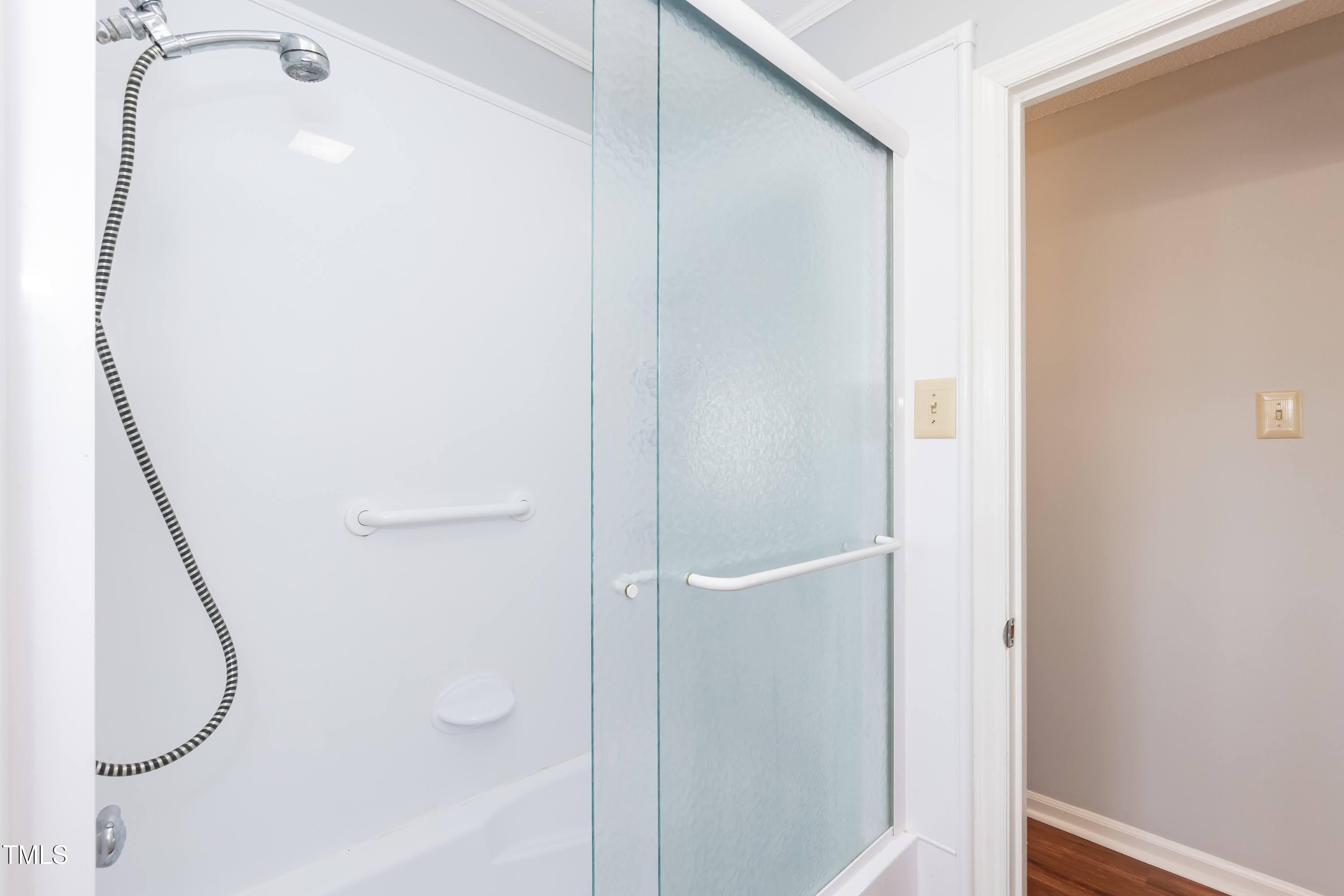 5604 Genesee Drive Durham, NC 27712 - Photo 31 of 45 a bathroom with a shower