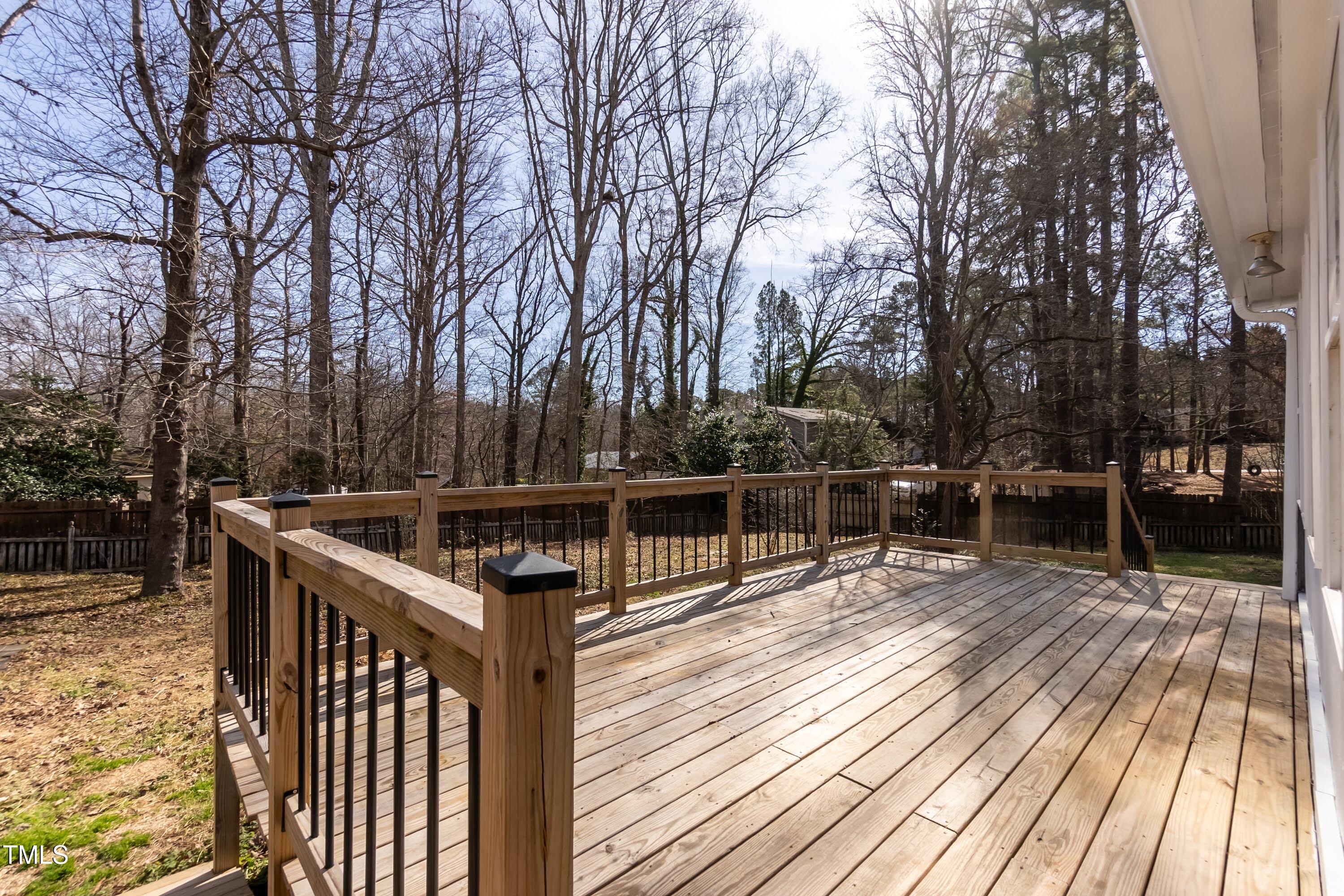 5604 Genesee Drive Durham, NC 27712 - Photo 34 of 45 a view of deck with chairs and wooden fence
