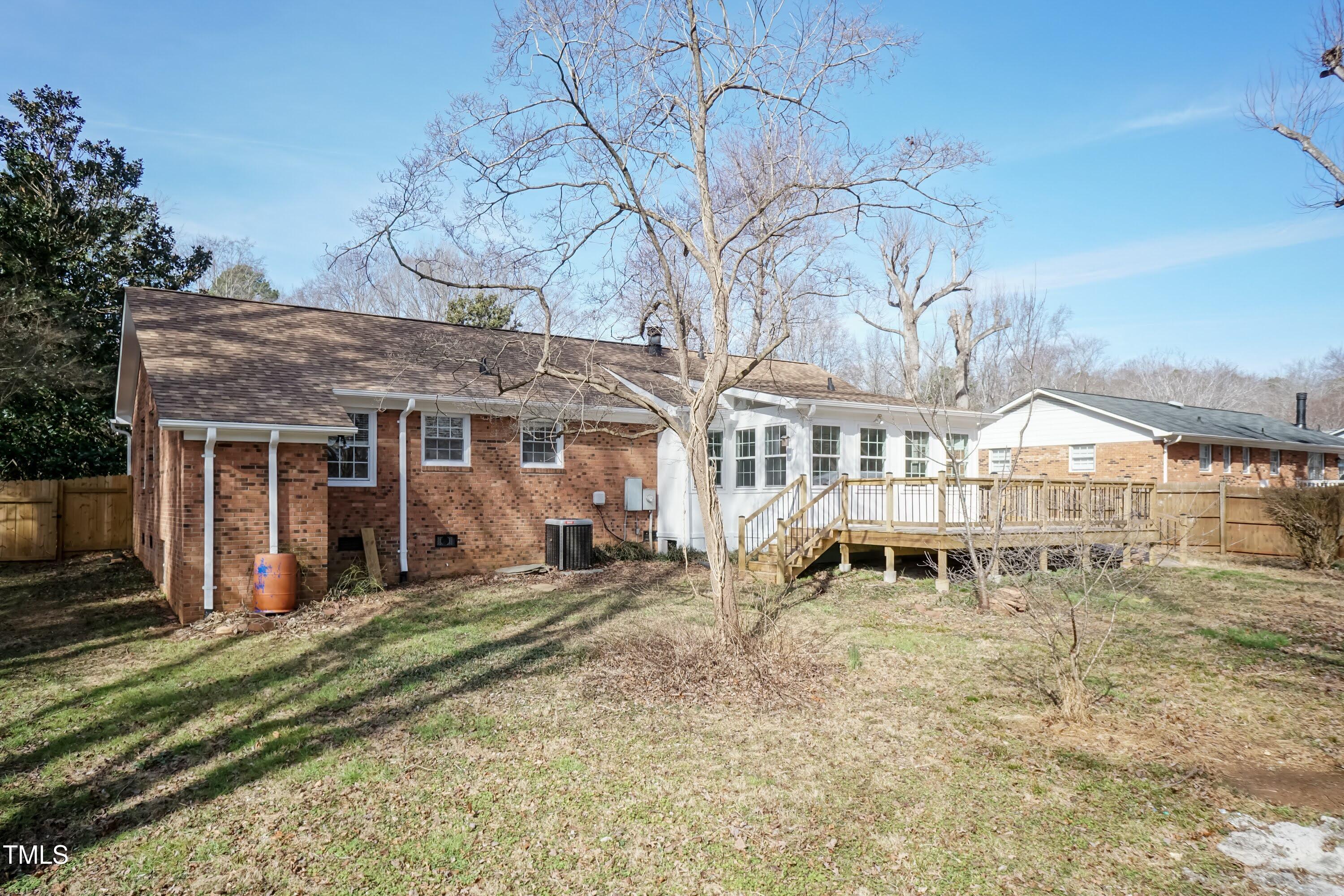 5604 Genesee Drive Durham, NC 27712 - Photo 38 of 45 a front view of a house with a yard