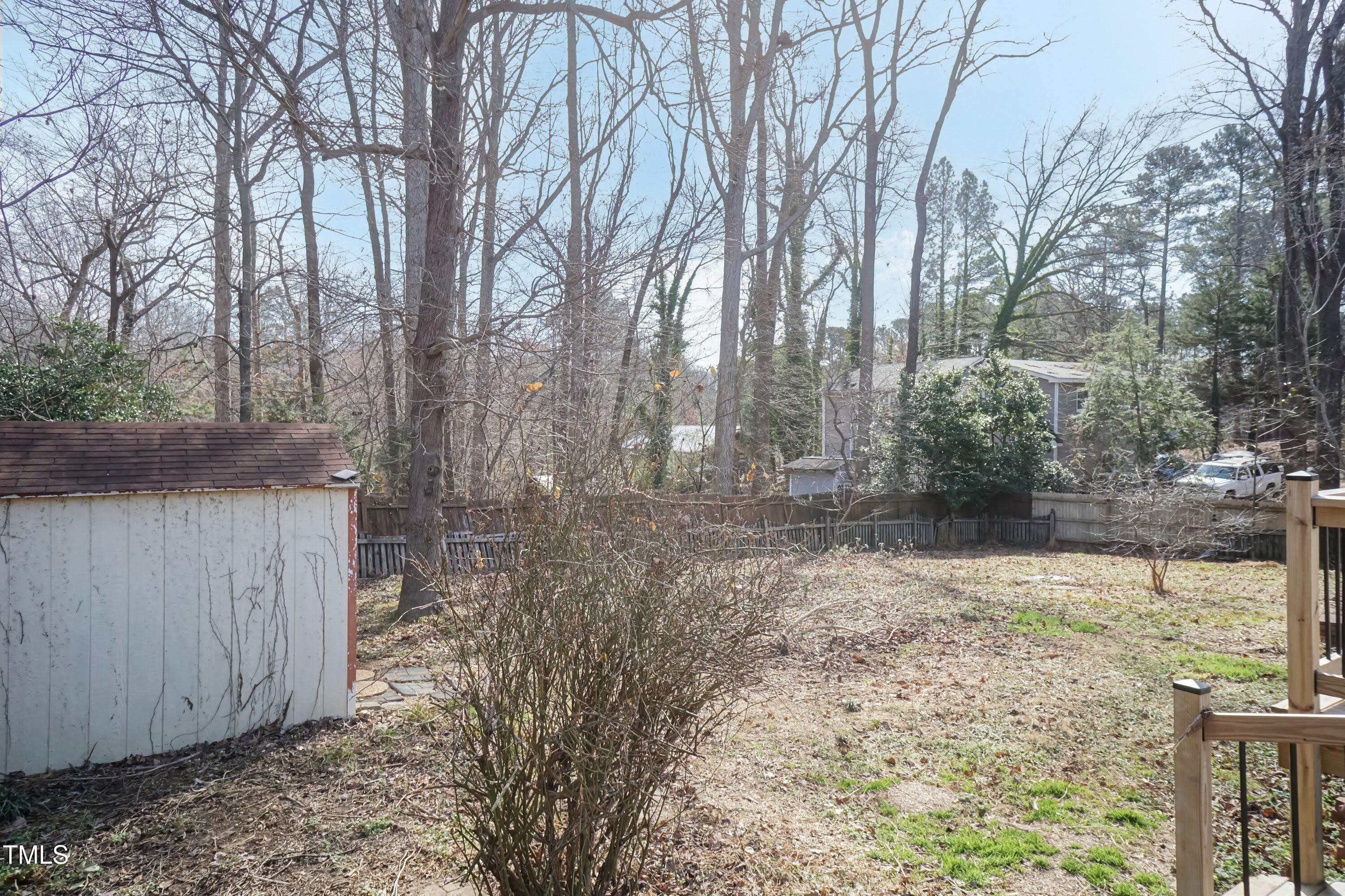 5604 Genesee Drive Durham, NC 27712 - Photo 42 of 45 a view of a yard with trees