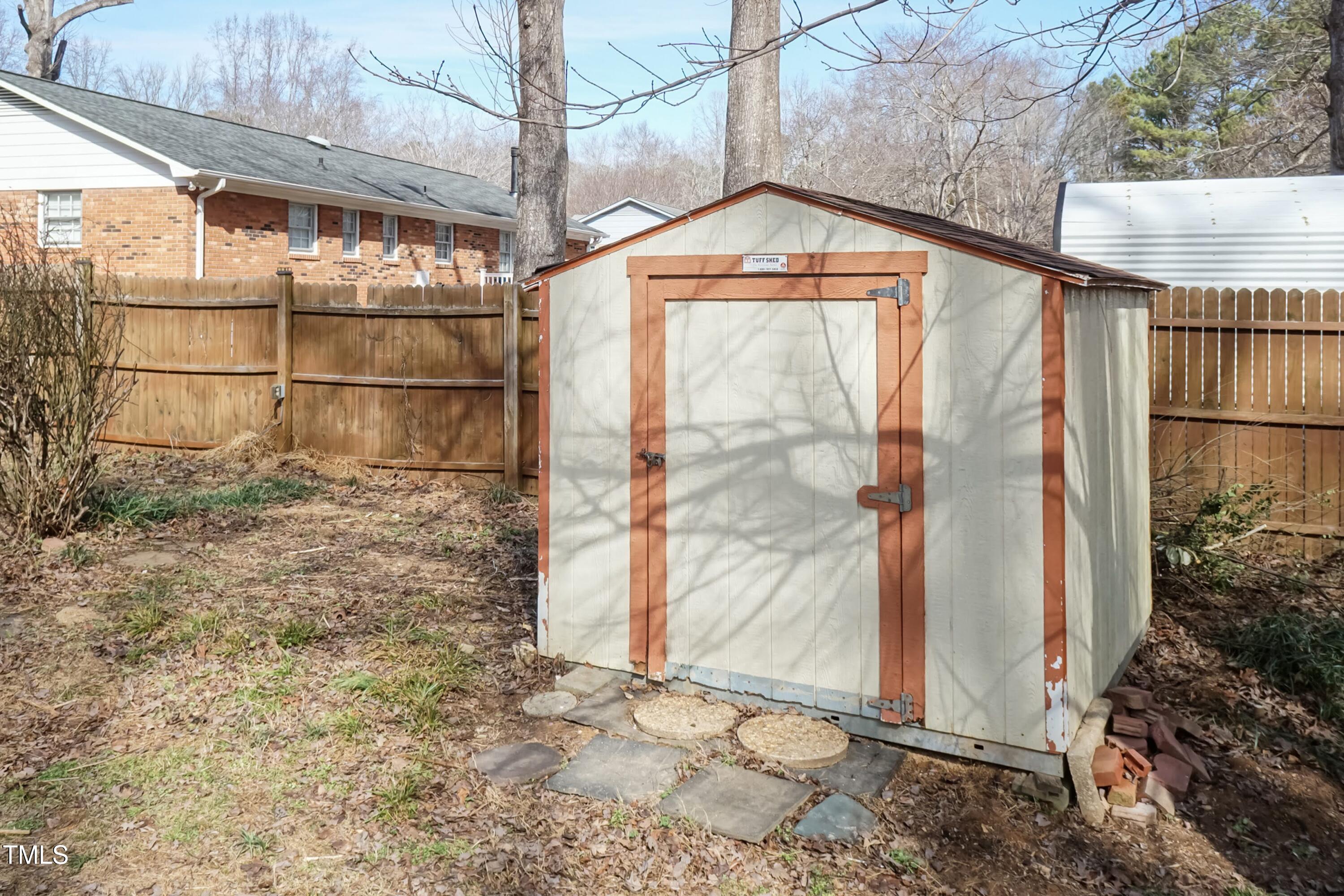 5604 Genesee Drive Durham, NC 27712 - Photo 44 of 45 a glass door with a outdoor space