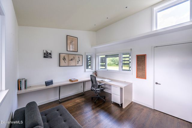 a view of a living room with a large window