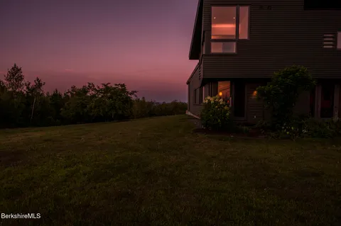 a view of a living room with furniture