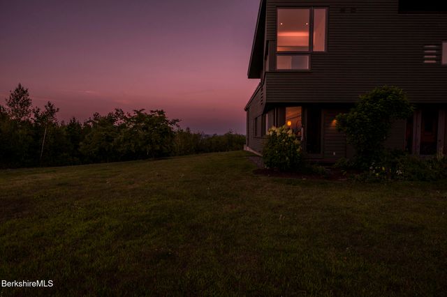 a view of a living room with furniture