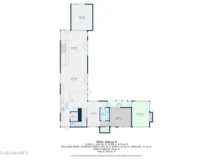 a picture of a wall with a table and chairs