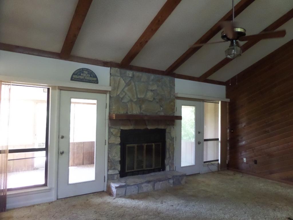 1456 Bay Grove Road Freeport, FL 32439 - Photo 4 of 9 a view of an empty room with a fireplace