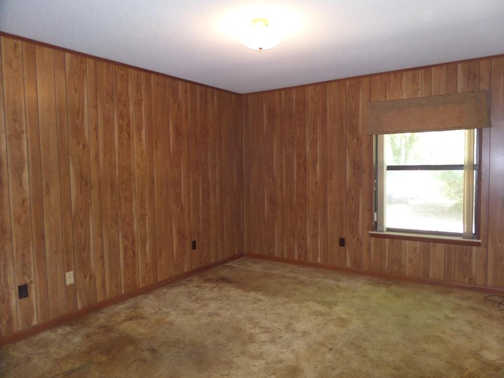 1456 Bay Grove Road Freeport, FL 32439 - Photo 8 of 9 an empty room with windows