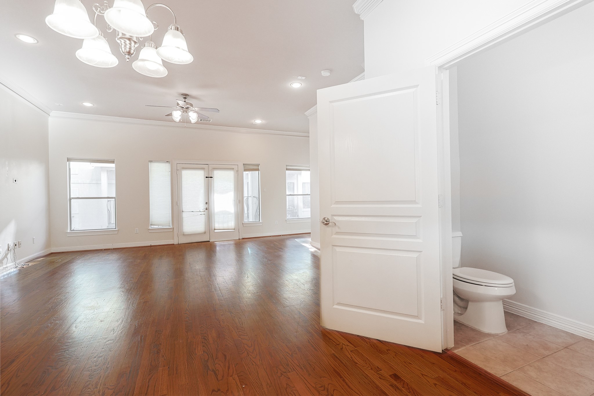 2540 Prospect Street, Unit C Houston, TX 77004 - Photo 16 of 31 a view of a room with wooden floor and window