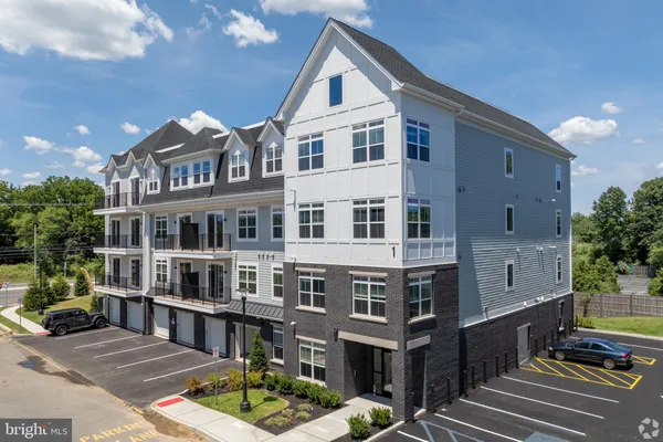 a view of a brick house with front door
