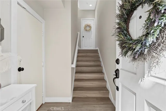 a view of swimming pool with outdoor seating and plants
