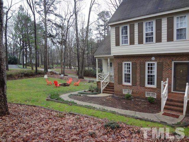 1400 October Road Raleigh, NC 27614 - Photo 2 of 25 a front view of a house with garden
