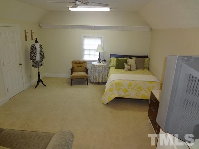 1400 October Road Raleigh, NC 27614 - Photo 19 of 25 a bedroom with bed and window