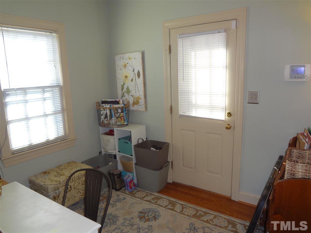 1400 October Road Raleigh, NC 27614 - Photo 21 of 25 a living room with furniture and a window