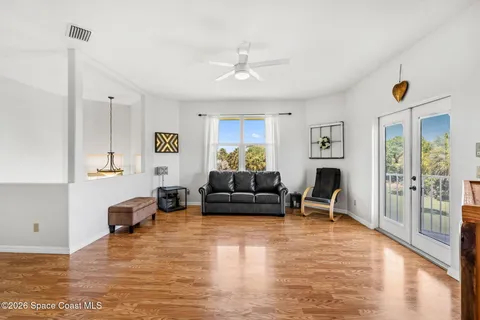 a view of livingroom with furniture and a flat screen tv