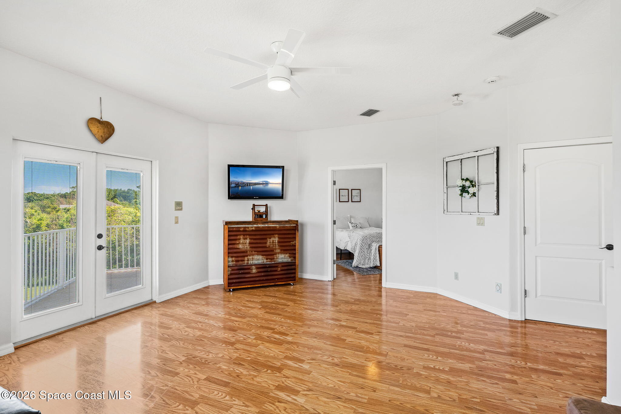 4010 Turkey Point Drive Melbourne, FL 32934 - Photo 26 of 53 a view of livingroom with furniture and a flat screen tv