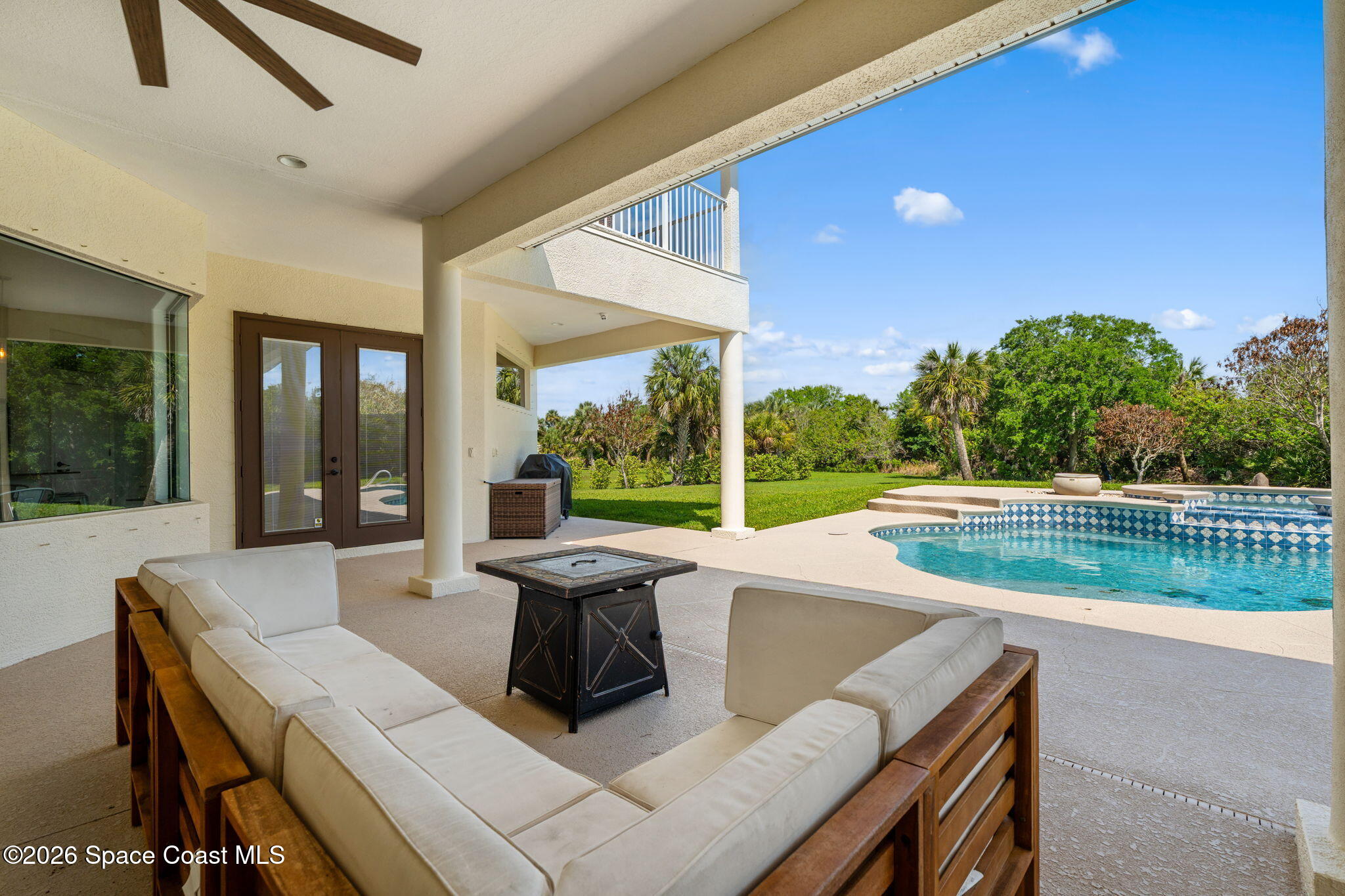 4010 Turkey Point Drive Melbourne, FL 32934 - Photo 37 of 53 a view of a patio with swimming pool