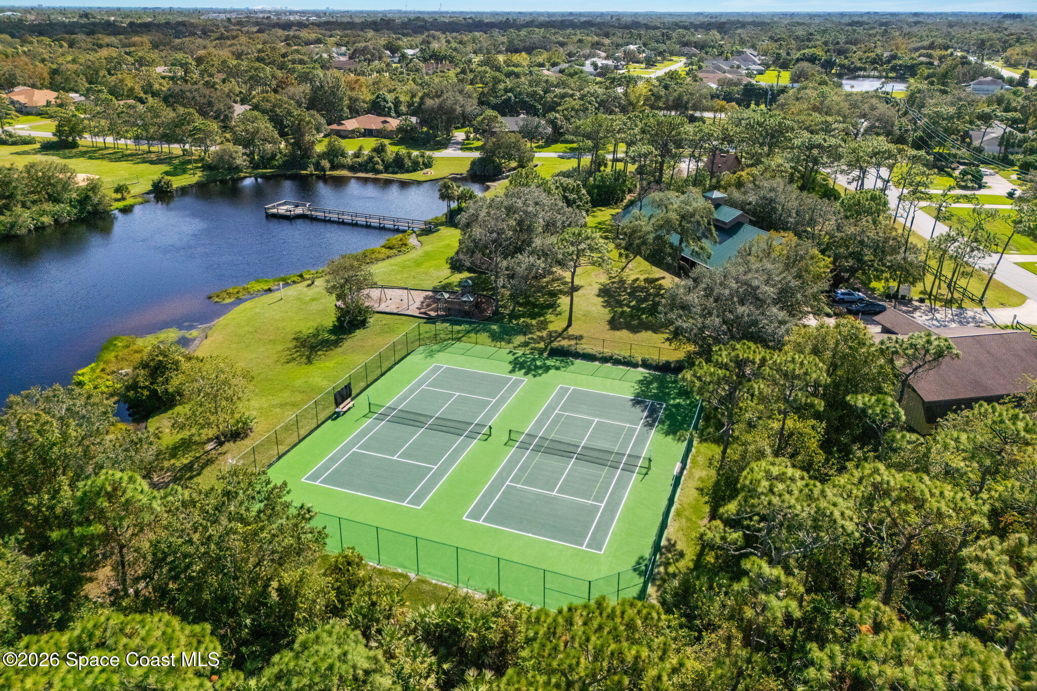 4010 Turkey Point Drive Melbourne, FL 32934 - Photo 52 of 53 an aerial view of residential houses with outdoor space