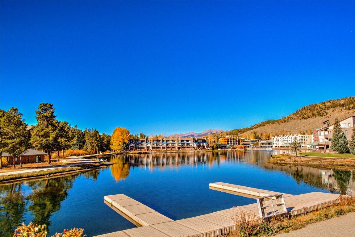 22340 Highway 6, Unit 1815 Keystone, CO 80435 - Photo 19 of 19 a view of ocean with boats and trees in the background