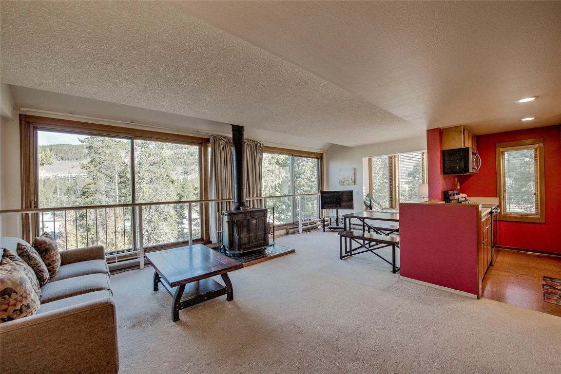 22340 Highway 6, Unit 1815 Keystone, CO 80435 - Photo 2 of 19 a living room with furniture and a large window