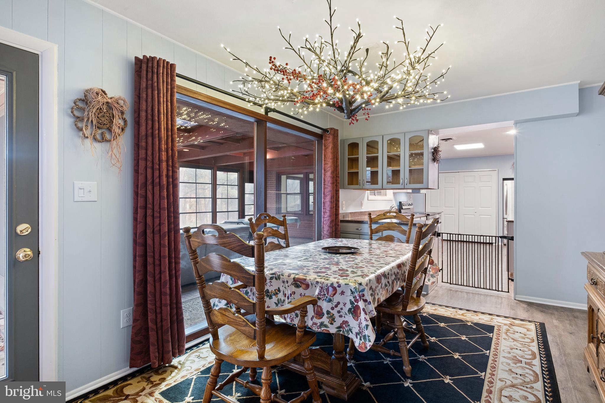 123 Unami Trail Newark, DE 19711 - Photo 15 of 31 a view of a dining room with furniture and chandelier