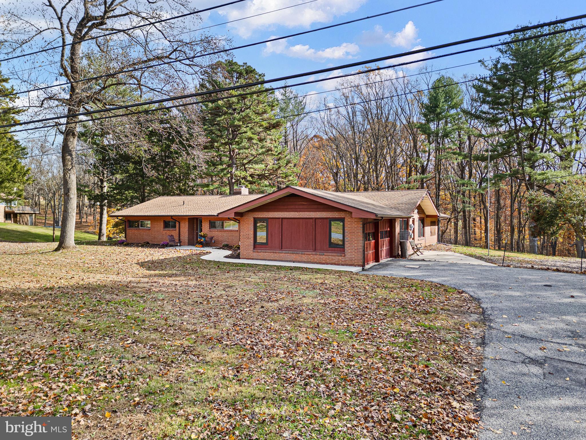 123 Unami Trail Newark, DE 19711 - Photo 2 of 31 a front view of a house with a garden