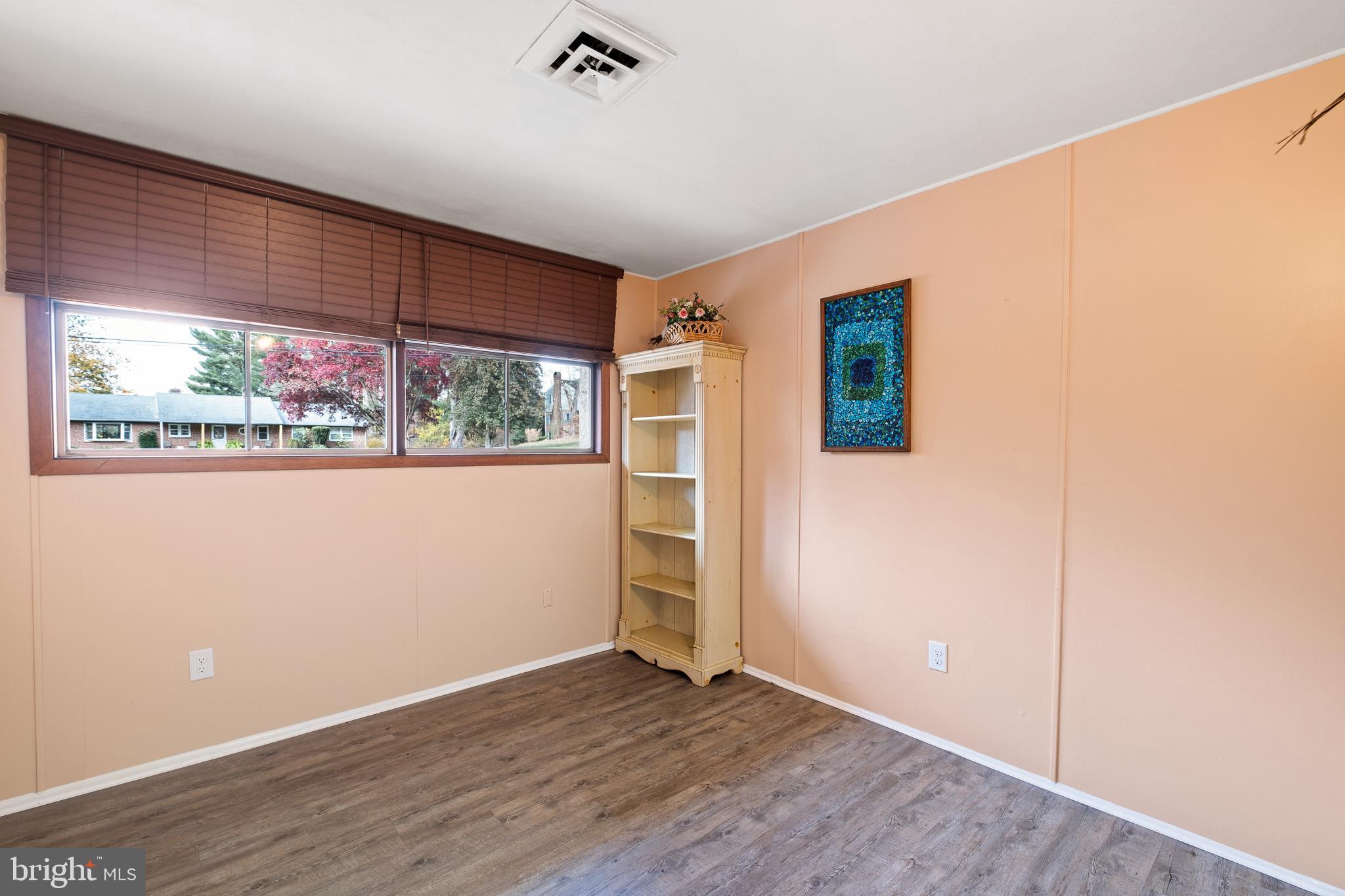 123 Unami Trail Newark, DE 19711 - Photo 26 of 31 an empty room with wooden floor and windows