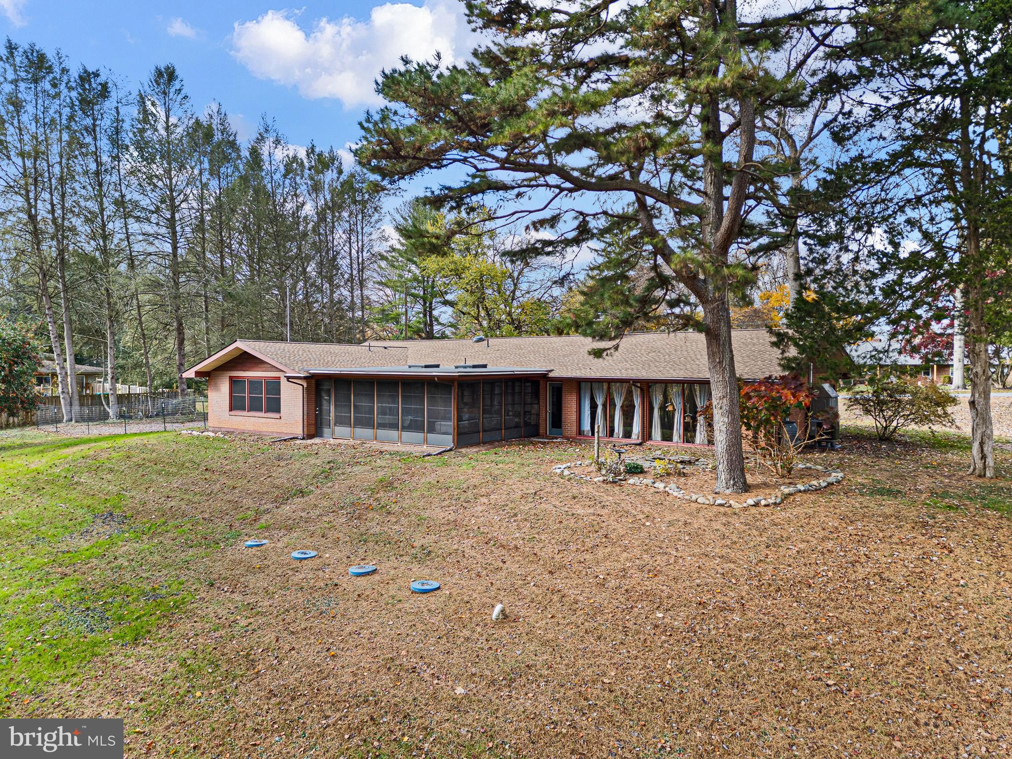 123 Unami Trail Newark, DE 19711 - Photo 4 of 31 a large house with large trees in front of it