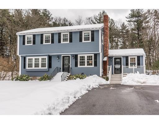 131 Cardigan Road Tewksbury, MA 01876 - Photo 1 of 30 a front view of a house with a yard
