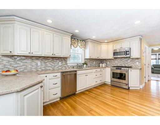 131 Cardigan Road Tewksbury, MA 01876 - Photo 16 of 30 a kitchen with stainless steel appliances granite countertop a stove sink and cabinets