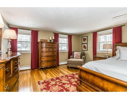 131 Cardigan Road Tewksbury, MA 01876 - Photo 25 of 30 a bedroom with a bed and wooden floor
