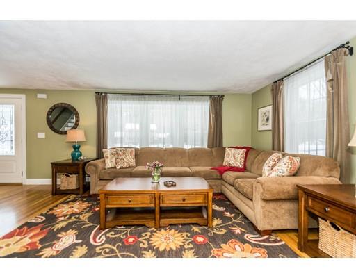 131 Cardigan Road Tewksbury, MA 01876 - Photo 10 of 30 a living room with furniture and a large window