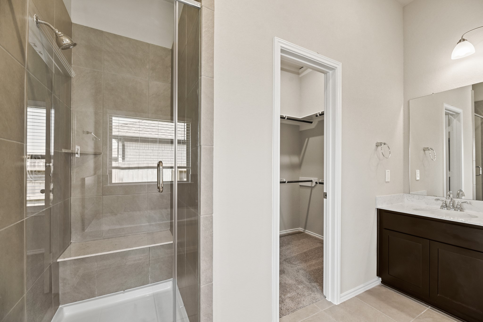 1330 Lakeside Creek Road Magnolia, TX 77354 - Photo 14 of 28 a bathroom with a shower sink and mirror