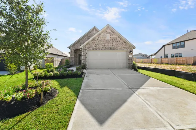 a house view with a garden space