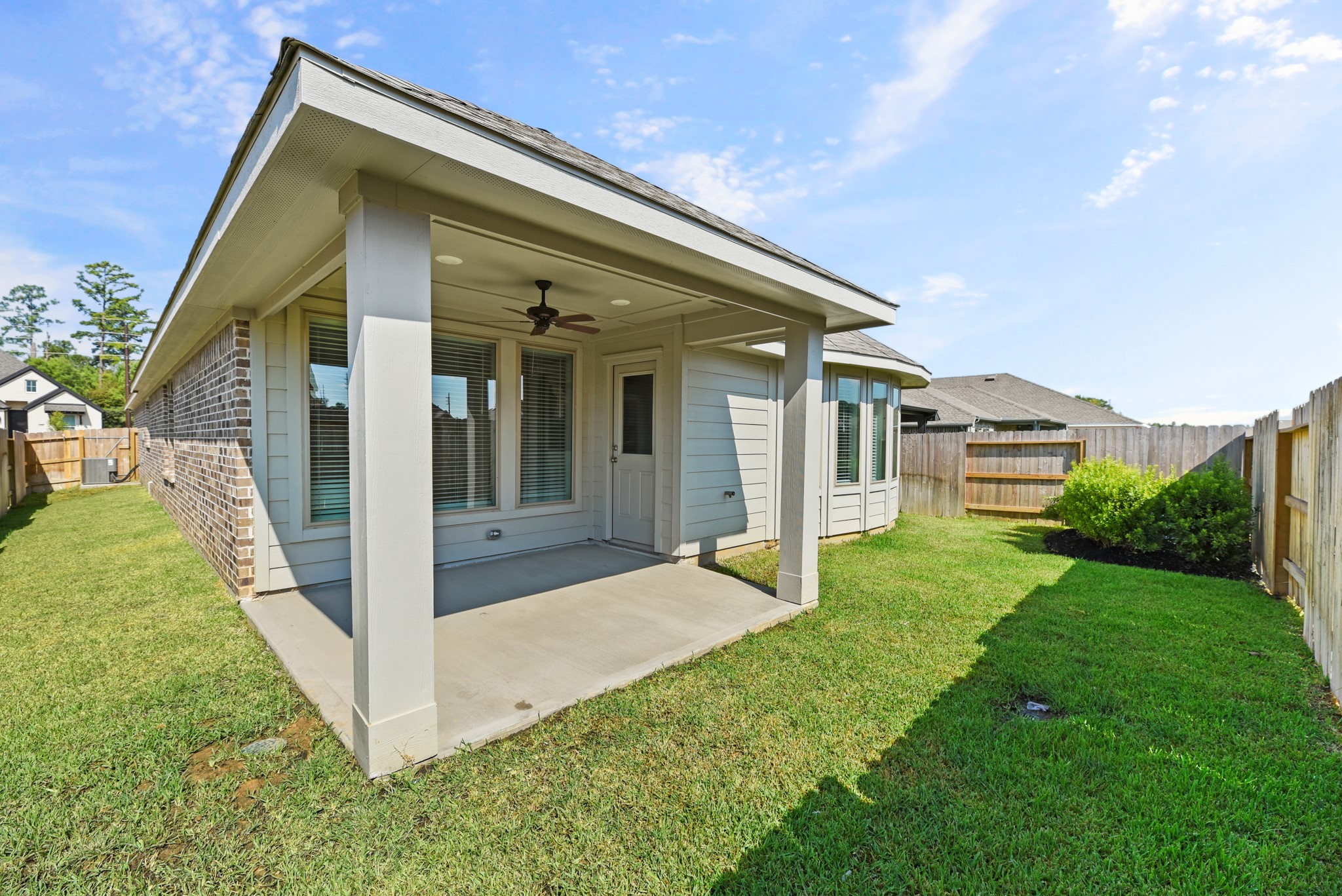 1330 Lakeside Creek Road Magnolia, TX 77354 - Photo 23 of 28 a view of house with backyard
