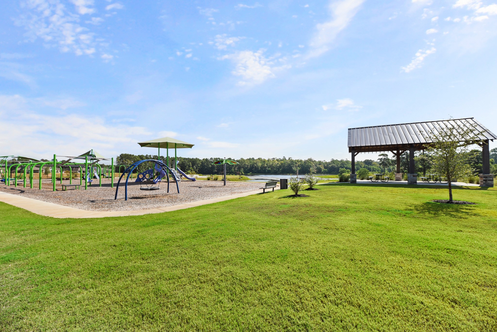 1330 Lakeside Creek Road Magnolia, TX 77354 - Photo 27 of 28 a view of a swimming pool and outdoor seating