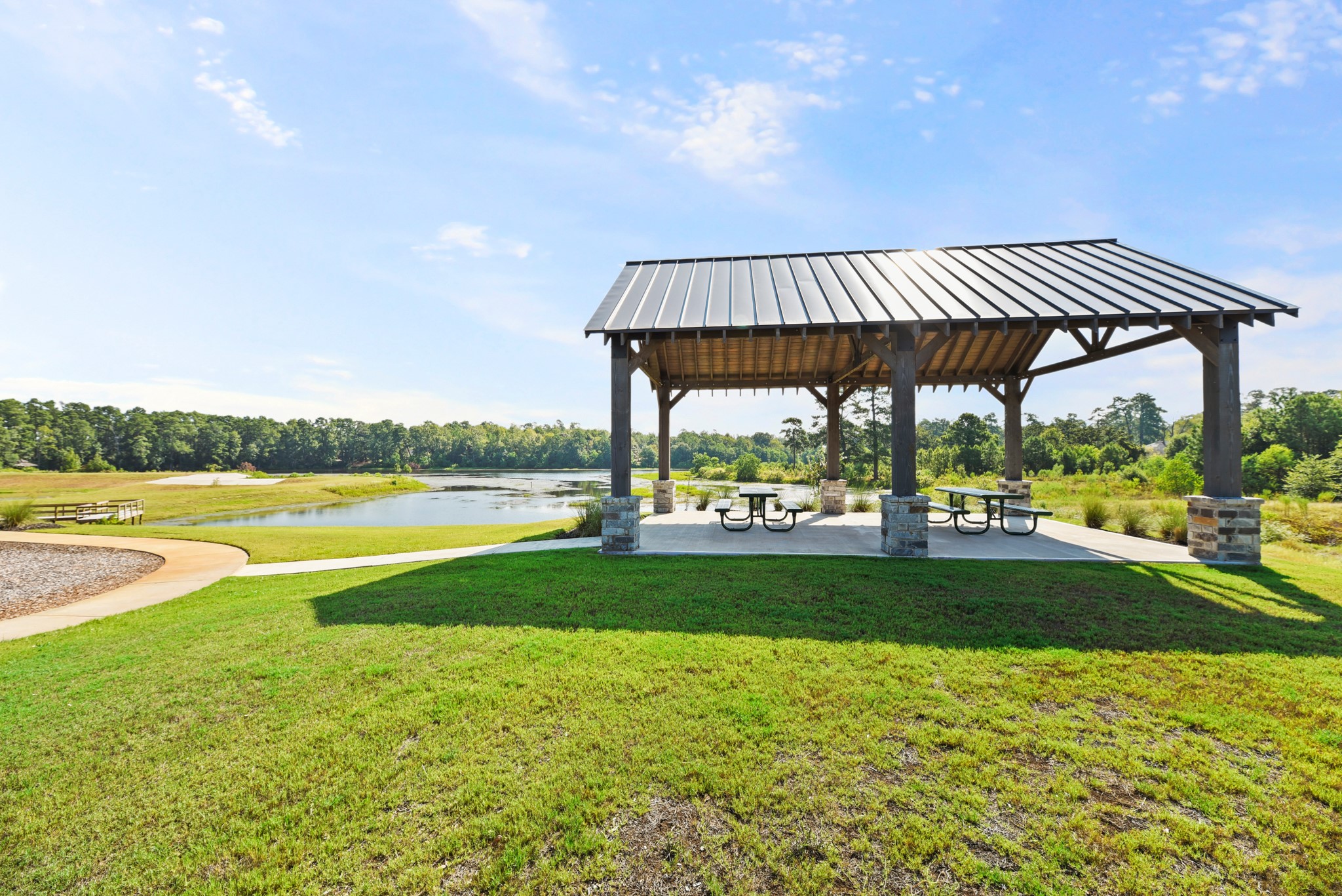 1330 Lakeside Creek Road Magnolia, TX 77354 - Photo 28 of 28 a view of a swimming pool and a yard