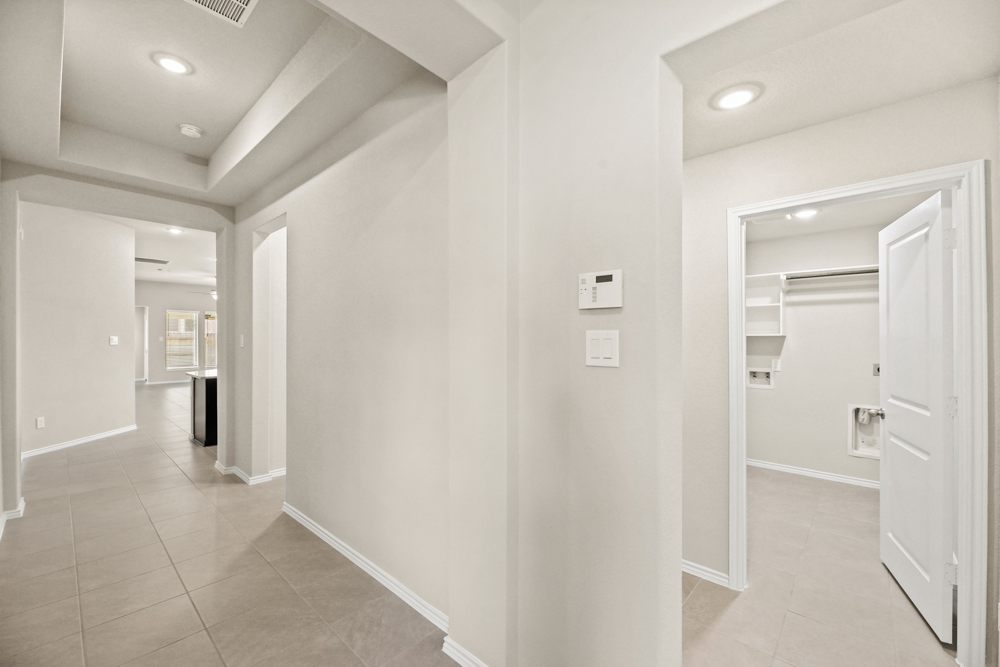 1330 Lakeside Creek Road Magnolia, TX 77354 - Photo 3 of 28 a view of a hallway with closet and bathroom