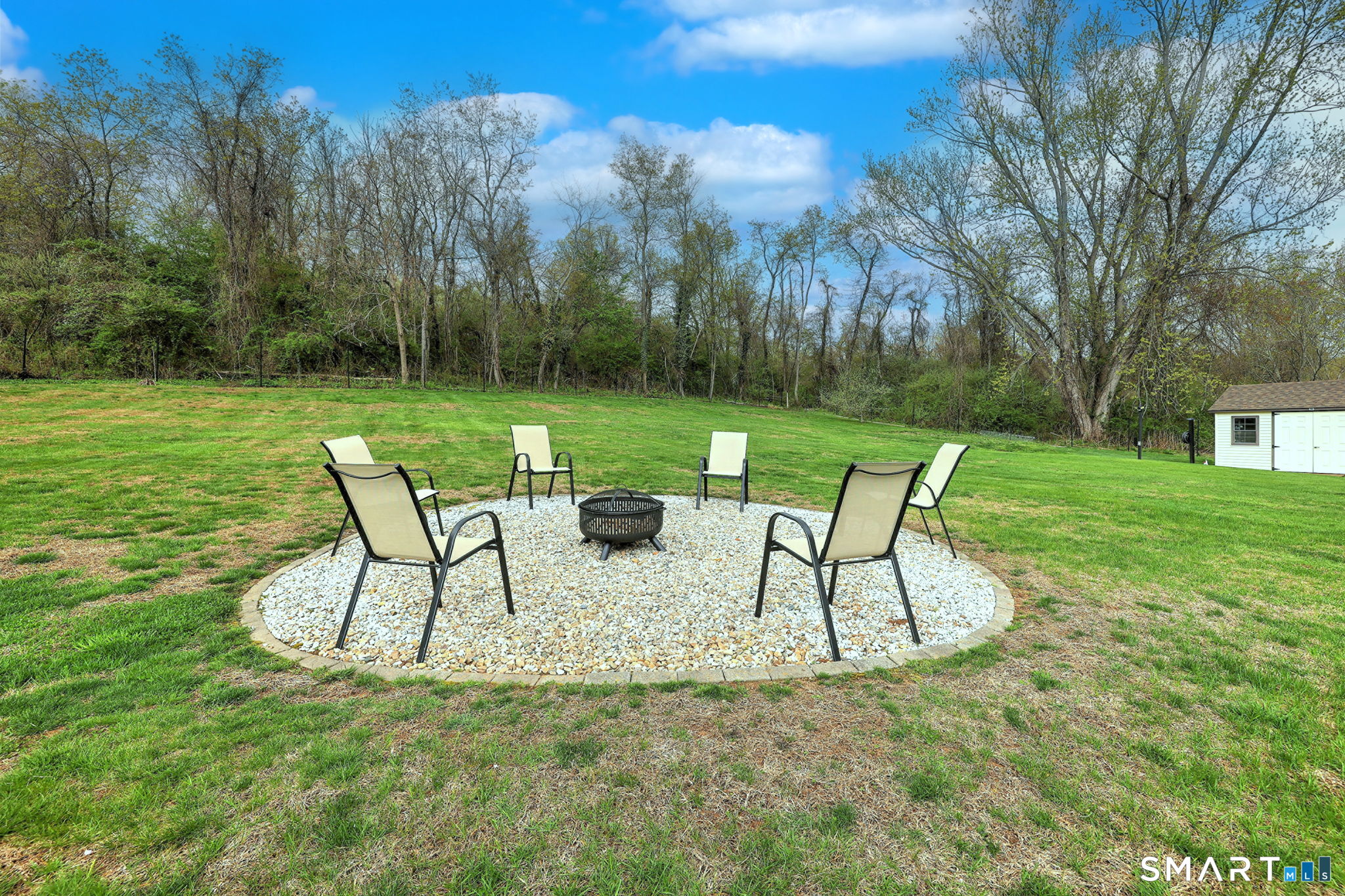 2262 Ridge Road North Haven, CT 06473 - Photo 20 of 40 a view of a table and chairs in patio