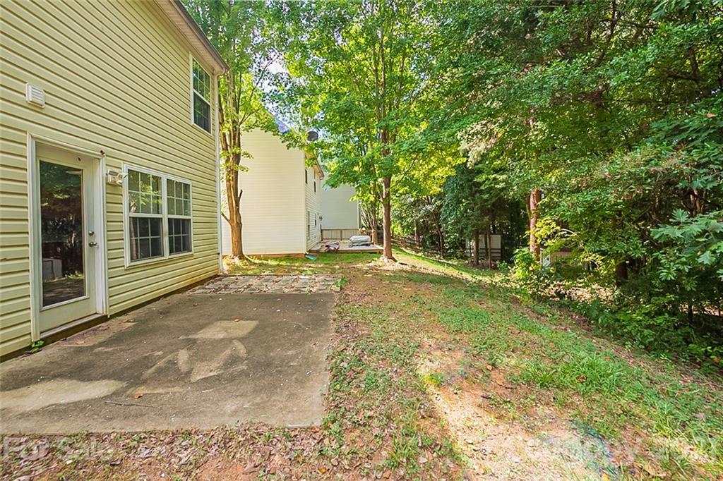 1827 Endeavor Lane Clover, SC 29710 - Photo 16 of 18 a view of a house with backyard and trees