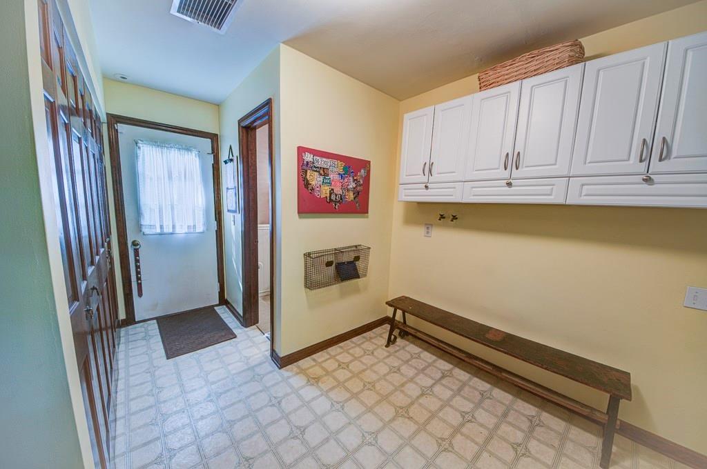 404 Gass Road Wexford, PA 15090 - Photo 20 of 20 Spacious mudroom with doors to front and back yards. Extra large closet and storage cabinets will keep the clutter under control. (Laundry was here before, so hook-ups still available.)