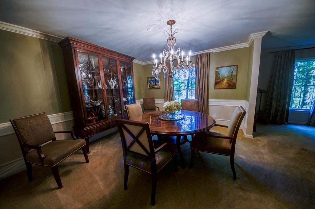 404 Gass Road Wexford, PA 15090 - Photo 4 of 20 Accented by an elegant wainscoting, the Formal Dining area is the perfect display space for art and china.